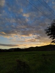 Sunset on a dirt road in the Brazilian countryside.