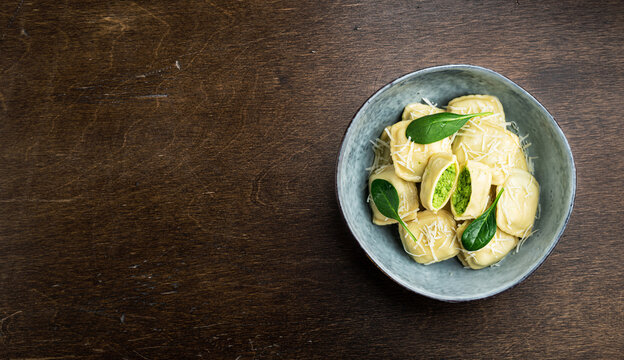 Italian Ravioli with ricotta and spinach, top view, copy space