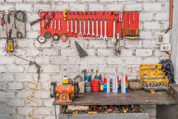 Wall full of tools in a mechanic repair garage