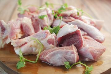 close up of raw meat on chopping board on a chopping board 