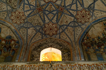 View through at the window of the ancient madrasah, Bukhara, Uzbekistan. - obrazy, fototapety, plakaty