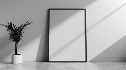 Minimalist mockup of a black metal picture frame against a white wall .