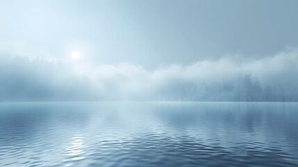 Misty morning scene with fog rising above a serene water body