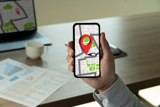 Hand Holding Cphone With Navigation LOCAL map Online Shopping And Local Shop Support