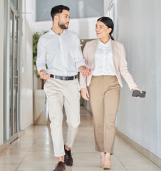 Business people, walking and happy conversation in corridor with gossip, smile and chat in office. Work, friends and woman with man for discussion, talking or news of project, ideas or communication