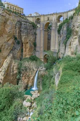 Keuken foto achterwand Ronda Puente Nuevo ronda ,malaga, spain 04/18/2023 new bridge over the cliff with a waterfall of the river guadalevin
