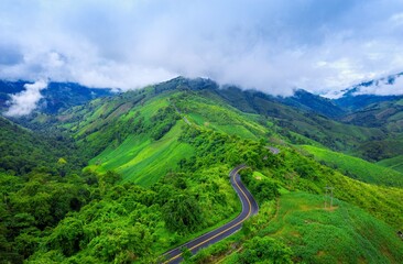 Aerial view beautiful sky road top mountains with green jungle nan province thailand