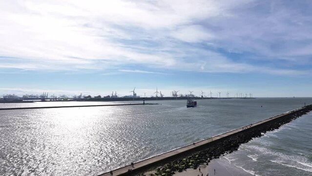 Hoek van Holland, Netherlands - The NCL Svelgen Navigating Through the Ship Canal - Aerial Drone Shot