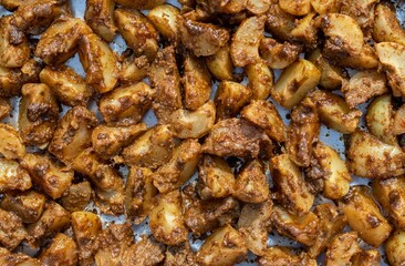 Indian Gooseberry  Cut Pieces or Amla Fruit Candy Coated with Spices, Salt, Sugar Powder Seasoning in Sun, Also Known as Emblica Myrobalan or Phyllanthus Emblica