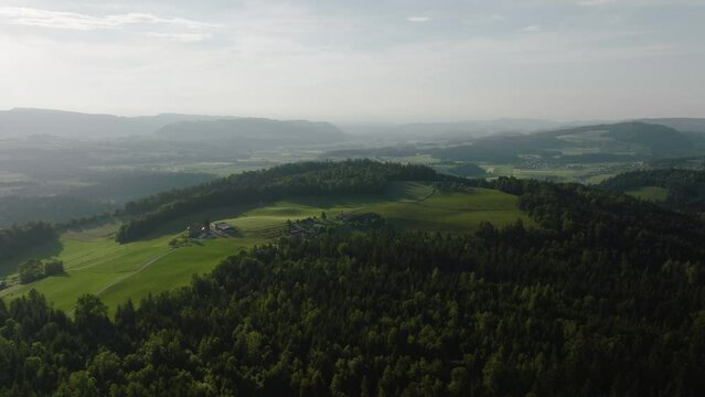 Aerial of a hilly landscape in rural Switzerland