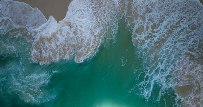 Kelingking Beach - Overhead View Of Waves In The Sandy Beach. - aerial shot