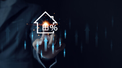 Man touches virtual house icon to analyze home loan and real estate mortgage insurance. interest...