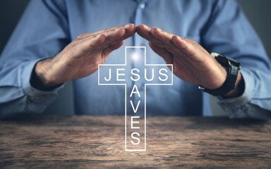 Man showing Christian cross. Jesus Saves. Religion. Love - 791337344