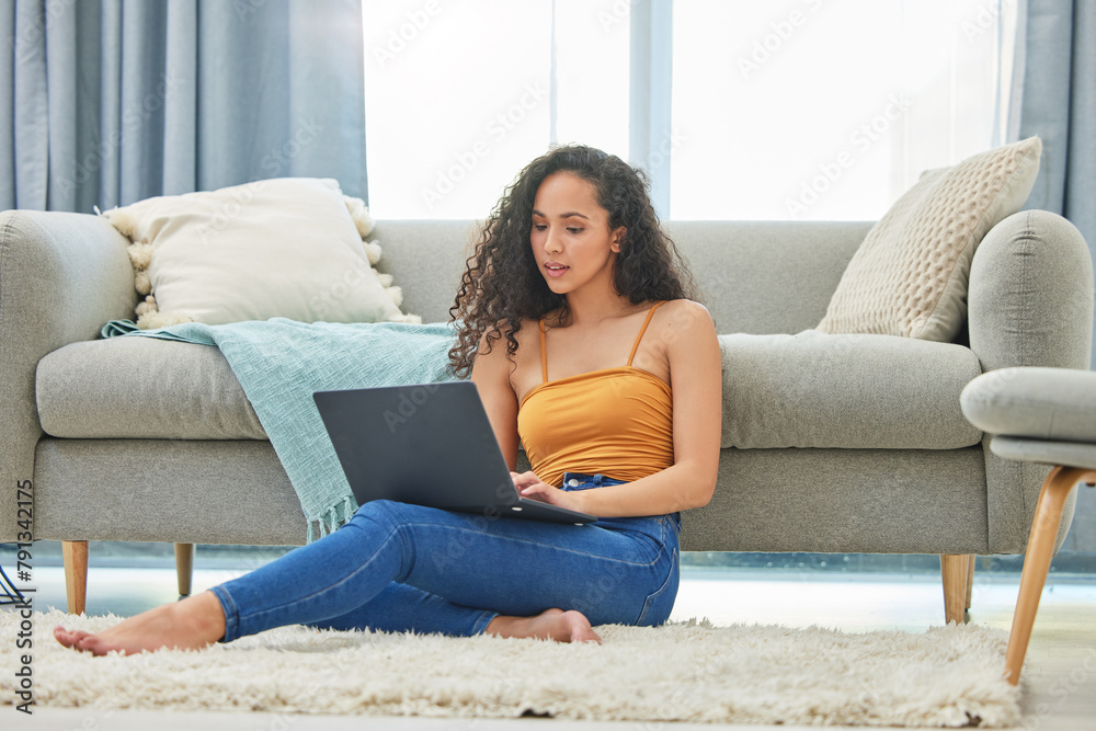 Wall mural Laptop, floor and woman in home online for remote work, online shopping and browse internet. Weekend, apartment and person on computer for social networking, website and research in living room