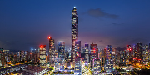 Shenzhen skyline cityscape with skyscrapers in downtown panorama at night in Shenzhen, China