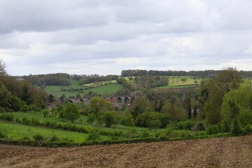 View of the little rural village Fouron or Voeren in Belgium, with a train bridge. This view can be seen along the Dutch mountain Trail, a hike path. This is near the dutch border. 