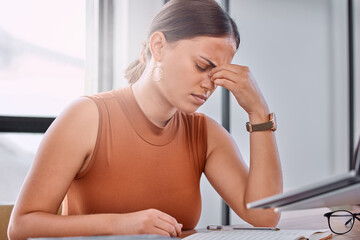 Woman, headache and stress in office with notebook, laptop or worry for deadline, report or...