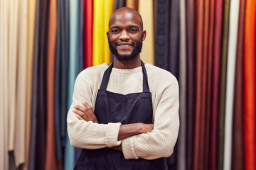 African man, portrait and smile for designer, small business owner and clothing workshop. Tailor,...