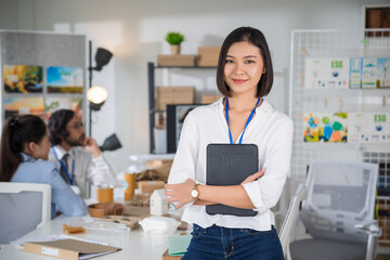 Portrait Young Asian woman in modern office