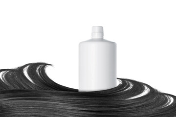Bottle wrapped in a strand of natural hair, isolated on white