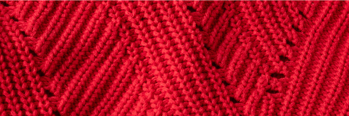 Close up of red knitted mesh fabric texture, banner size