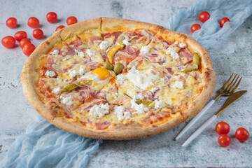 pizza with tomatoes and cheese