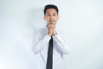 Adult Asian man relax while imagine something with happy expression