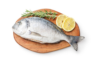 Fresh sea bream fish, rosemary and lemon on cutting board isolated on white background. - 791405356