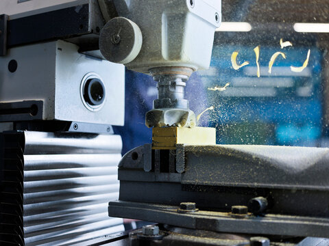 Computerized wood cutting machine at factory