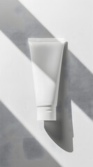 Blank white cosmetic cream tube mockup isolated on background. Hand cream tube 