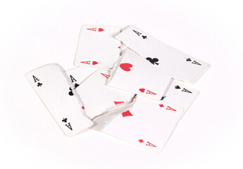 Playing card, torn in pieces