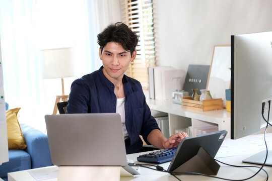 Man working with computer at home office, Working at home, Online learning education