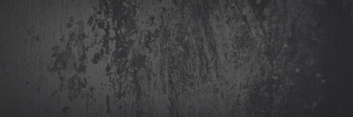Texture of old concrete wall. Rough faded dark gray concrete surface with spots, cracks, noise and...