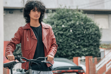 urban young man with bike on the street