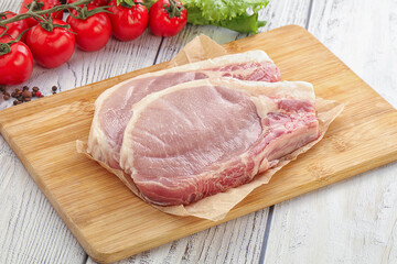 Raw pork t-bone steak for grill