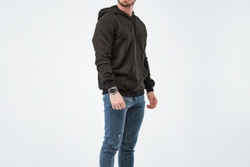 Horizontal studio photo empty hoodie sweater mockup. brand and logo design template of the young bearded man wearing daily apparel. Blank shirt with hood.