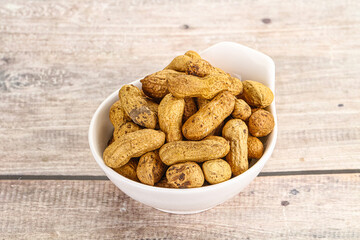 Raw ripe unpeeled peanut heap