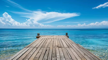 Foto op Plexiglas wooden pier on a beach © Laura