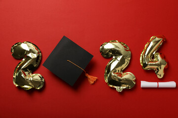 Graduate attributes and inflatable balloons in the shape of numbers 2024.