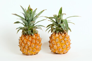 Two Pineapples Sitting Together