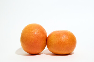 Two Oranges on White Surface