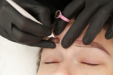 Microblading - semi-permanent tattooing technique used for the eyebrows by creating an illusion of...