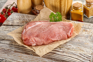 Raw pork schnitzel for cooking