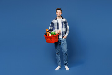 Full body young happy man wear shirt white t-shirt casual clothes hold basket bag for takeaway mock...