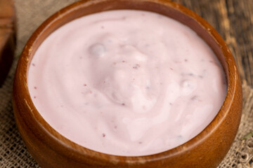 delicious ripe blackberries and yogurt made from milk