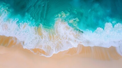 Fototapeta na wymiar Beautiful beach with turquoise water and waves from above, top view