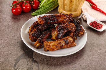 Grilled pork ribs in barbecue sauce