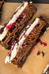 cottage cheese dessert with cherry jam covered with chocolate