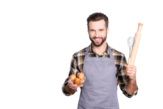 Portrait with copyspace, empty place for advertisement of attractive cheerful cook is ready to make some meal, having showing equipments, standing over grey background - Powered by Adobe