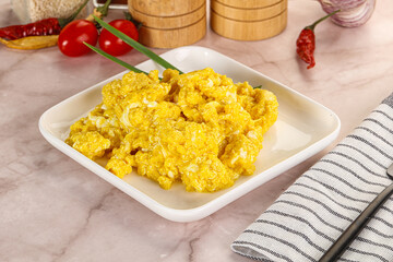 Scrambled egg in the bowl